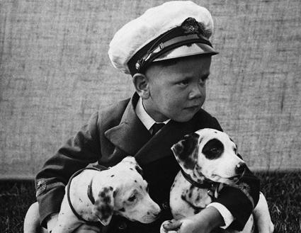 Boy with two dogs